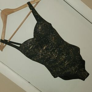 Niptuck black with gold floral print  slimming one piece size 4